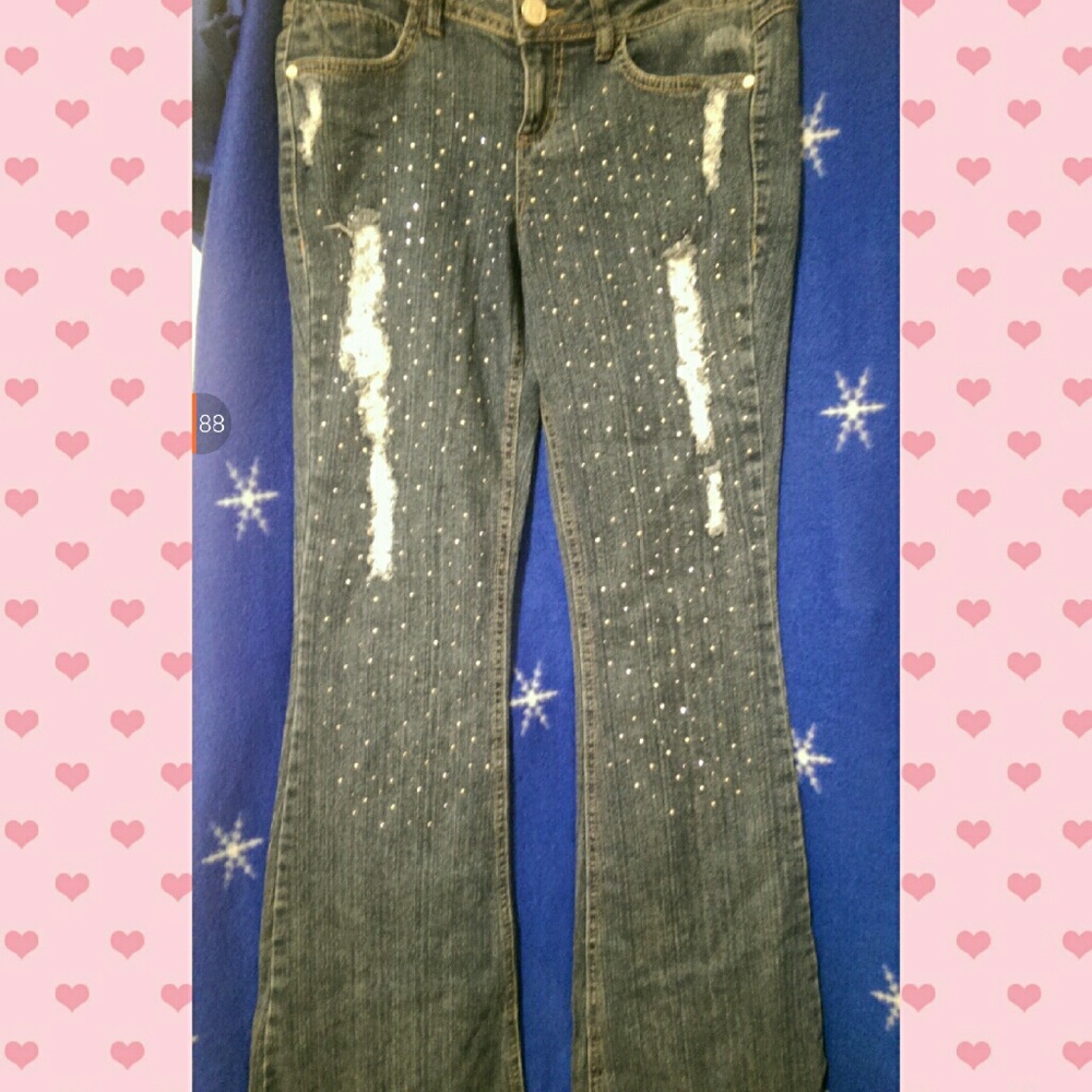 💜MATERIAL GIRL" blue distressed jeans.